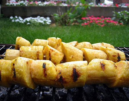 I put the plantains on skewers to make them easier to turn on the grill.