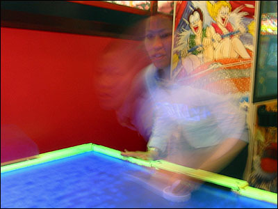 Jeannette playing air hockey